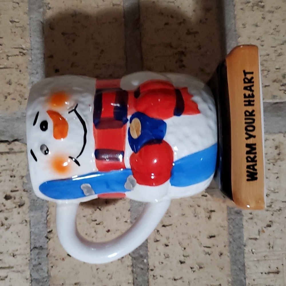 Smiling Snowman with Ski and Cup of Cocoa Mug